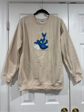Cream Crewneck Sweater with Blue Cartoon Motif